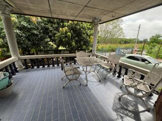 Outdoor balcony with seating area