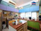 Modern kitchen with colorful cabinets and appliances