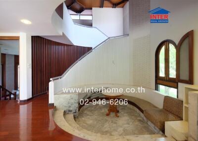 Spacious interior lobby area with stairwell