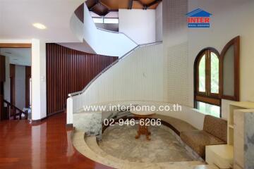 Spacious interior lobby area with stairwell