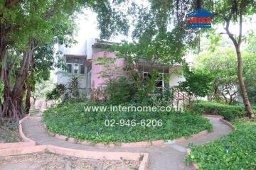 Front view of a house with a garden