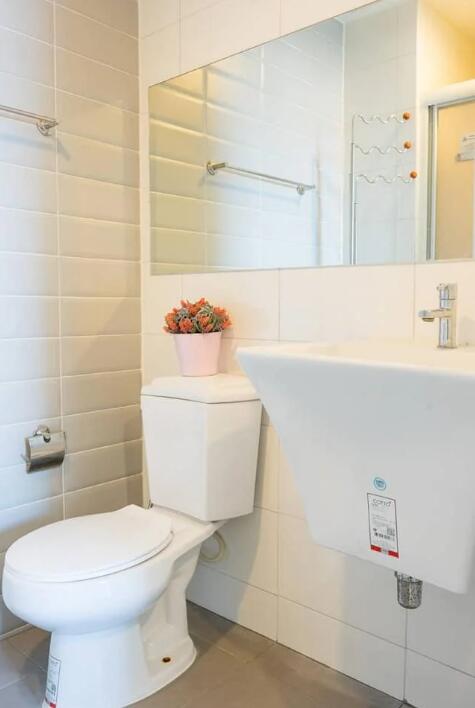 Modern bathroom with white tiles