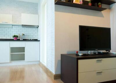 Living room with a view of the kitchen