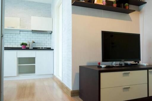 Living room with a view of the kitchen