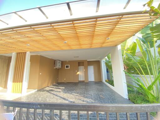 front view of a modern house with a carport