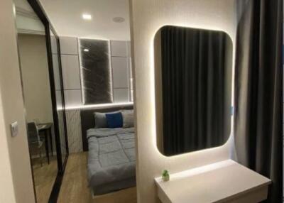 Modern bedroom with a vanity area