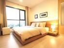 Spacious and well-lit bedroom with double bed and modern decor