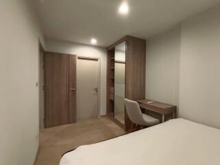 Modern bedroom with wooden furniture