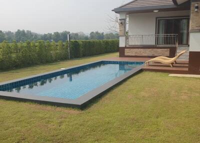 Discover your dream house for sale in Chiang Mai This property offers a spacious 4-bed house with a saltwater pool, parking for 4 cars, and more. Explore now!