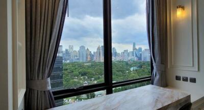 City view through a window with curtains