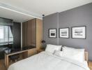 Modern bedroom with bed, wardrobe, and decor