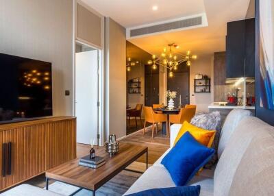 Modern living room with a view of dining area and contemporary decor