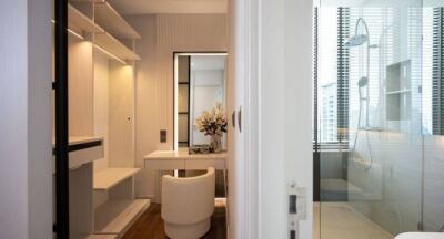 Modern bedroom with vanity and shower