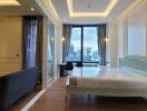 Modern bedroom with large windows and contemporary furnishings