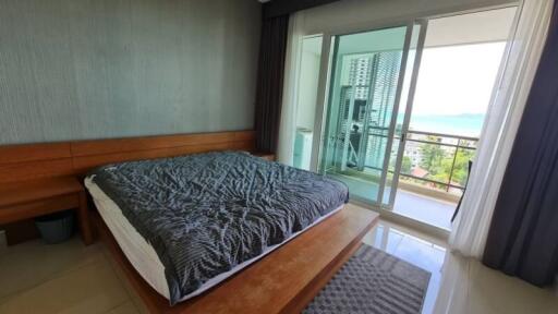 Bedroom with bed and balcony