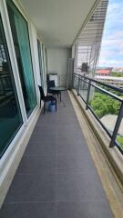 Photo of a balcony with seating and view