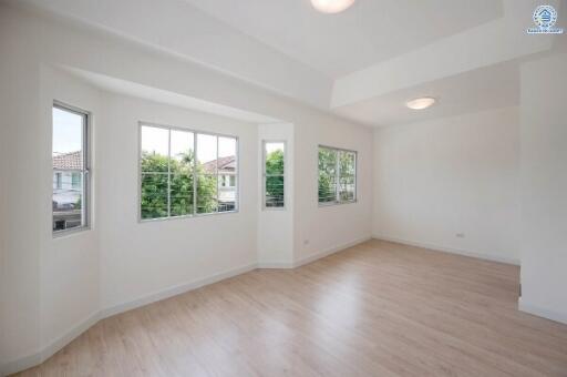 Bright and spacious living room with large windows