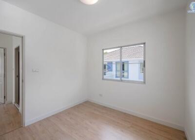 Unfurnished bedroom with window
