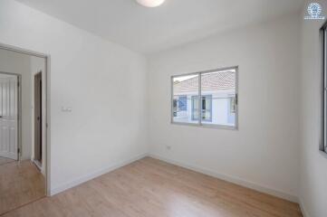 Unfurnished bedroom with window