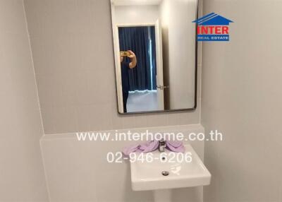 Small bathroom with mirror and sink