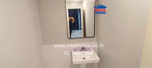 Small bathroom with mirror and sink