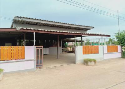 Front view of a house with a carport