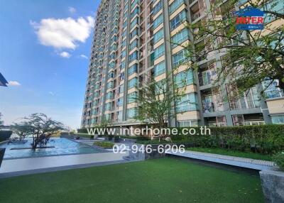 High-rise residential building with garden and pool