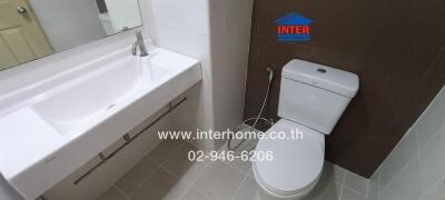 Modern bathroom with sink and toilet