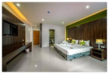 Modern bedroom with elegant decor and ensuite bathroom