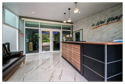 reception area with marble flooring and check-in counter