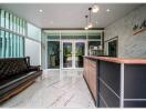 Lobby with seating area and reception desk