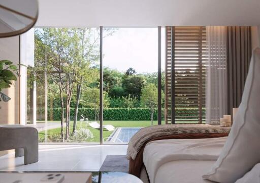 Modern bedroom with large windows overlooking a garden and pool