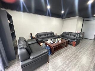 Living room with leather sofas and a coffee table