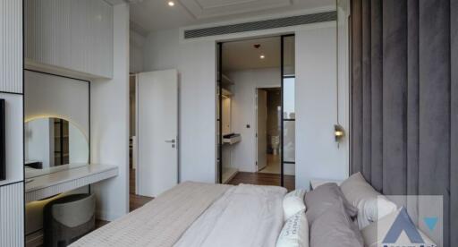 Modern bedroom with vanity and ensuite bathroom