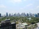 View of a city with a park in the foreground