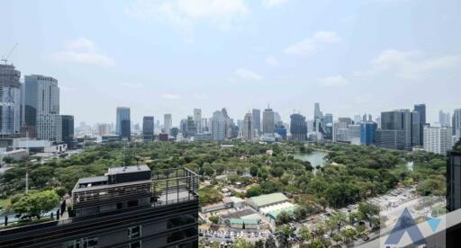 View of a city with a park in the foreground