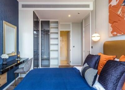 Modern bedroom with a blue-themed decor