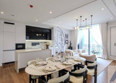 Modern kitchen and dining area with adjacent living space