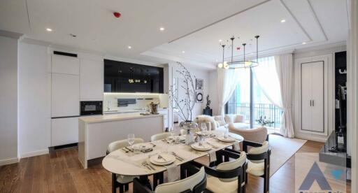 Modern kitchen and dining area with adjacent living space