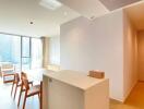 Modern living room with dining area and natural light