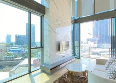 Modern high-rise living room with large windows