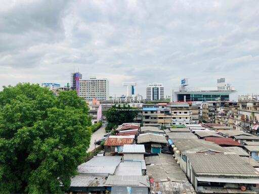 View of a city with buildings and greenery