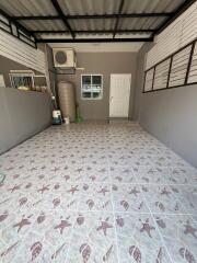 Well-maintained garage space with tiled flooring