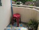 Small balcony with a view and colorful tiled floor