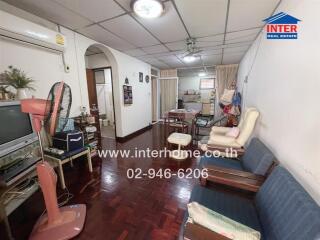 Living room with furniture and appliances