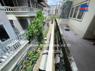 View from balcony over garden and street