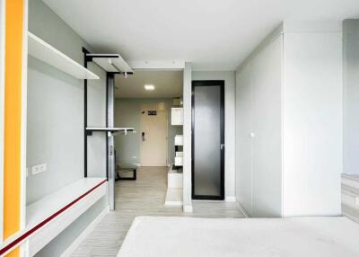 Modern bedroom with built-in storage and minimalist decor