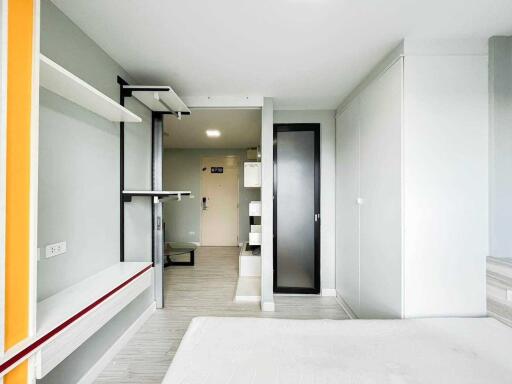 Modern bedroom with built-in storage and minimalist decor