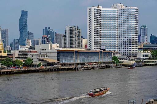 View of riverside buildings and city skyline