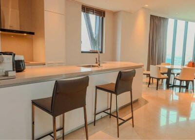 Modern kitchen with island and dining area